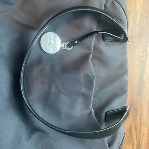 Lo & Sons OG Bag, Dark Grey exterior, silver hardware, blue interior